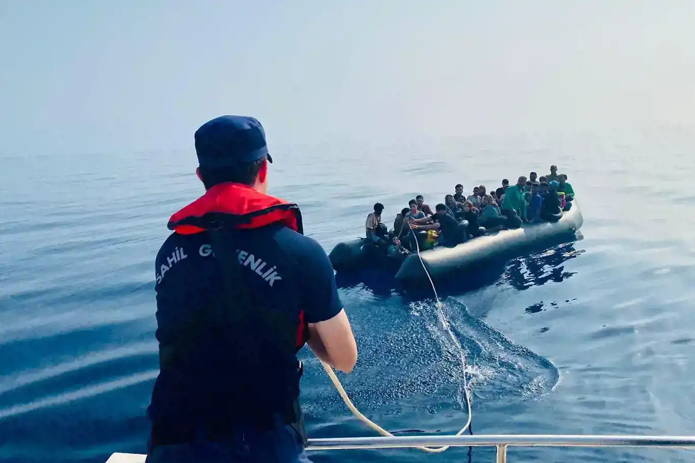 Turkish coast guard rescues 156 irregular migrants pushed back by Greek forces Turkish coast guard rescues 156 irregular migrants pushed back by Greek forces