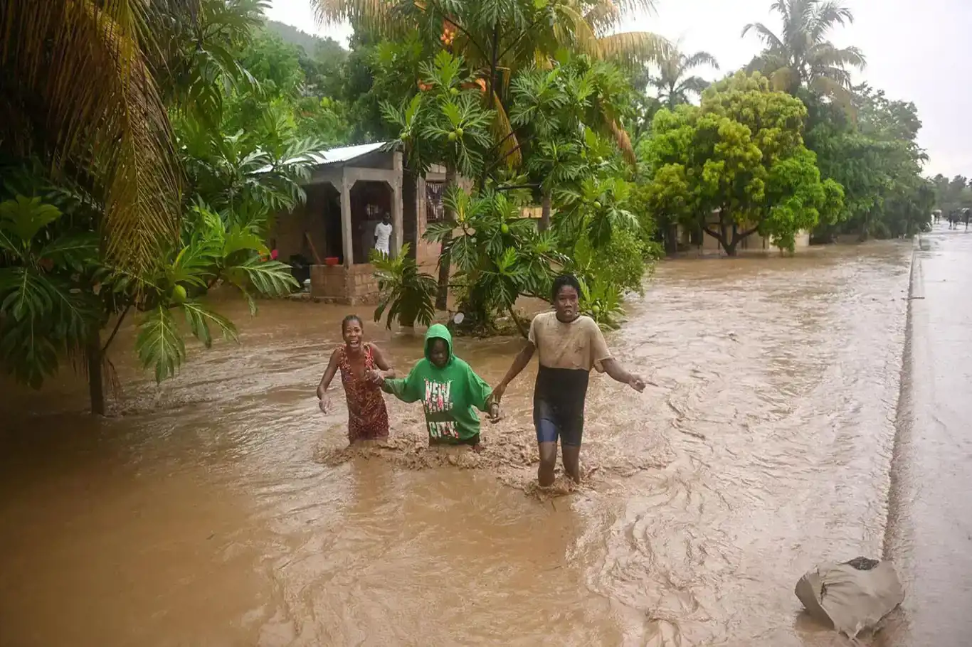 Heavy rains in Haiti cause devastating floods, leaving dozens dead and displaced