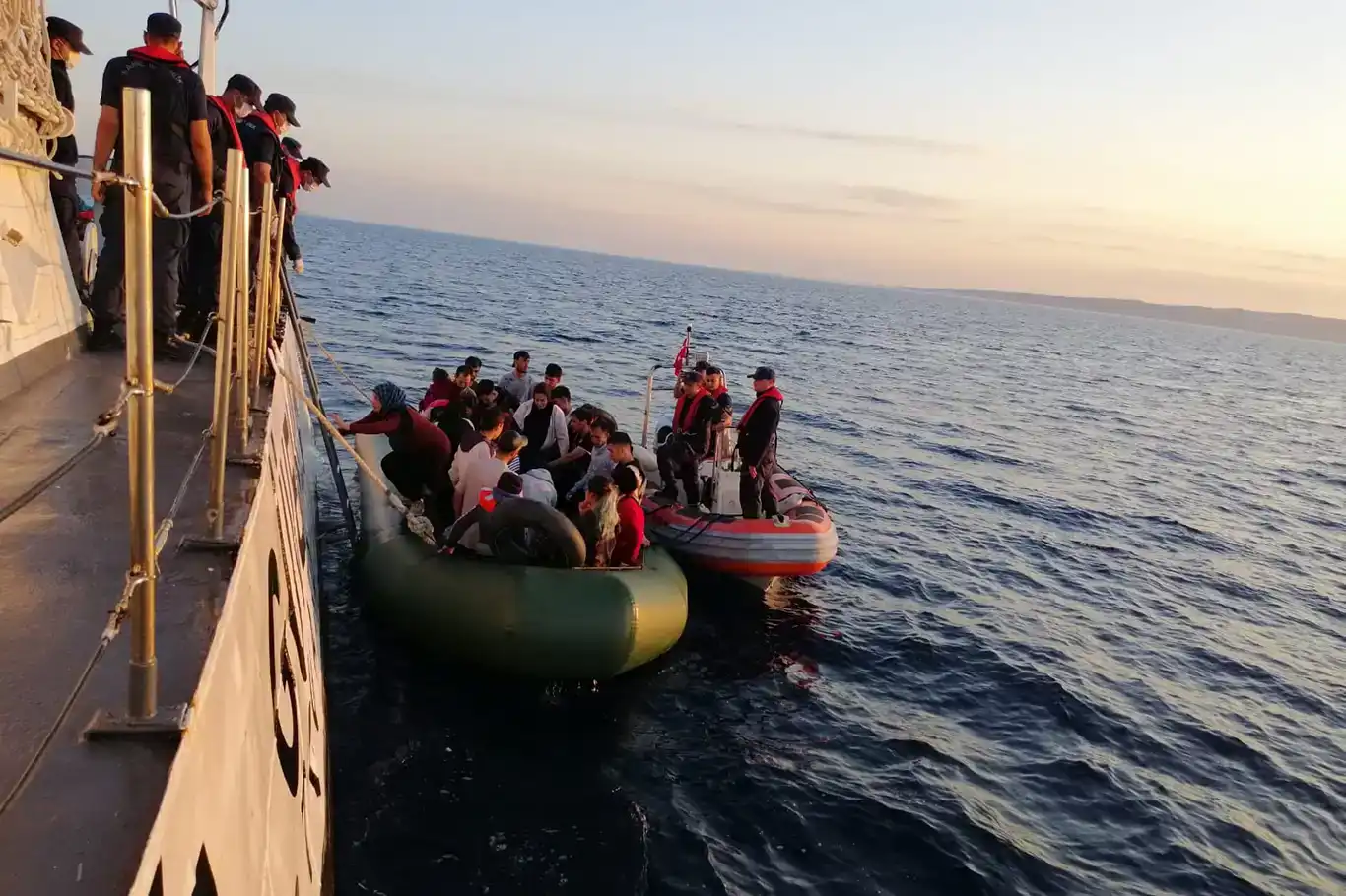 Turkish coast guard rescues migrants after Greece pushes back rubber boat