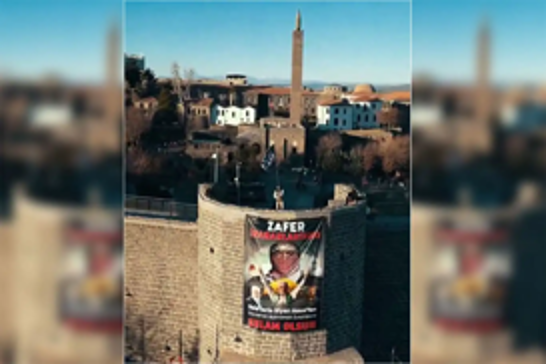 Historic Diyarbakır walls adorned with Pro-Palestinian banner