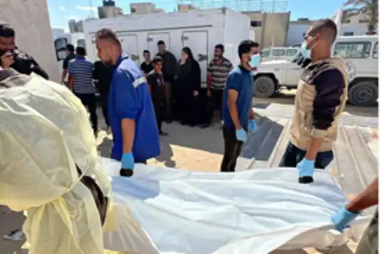 وزارة الصحة في غزة تستلم رفات 15 شهيداً عبر الصليب الأحمر