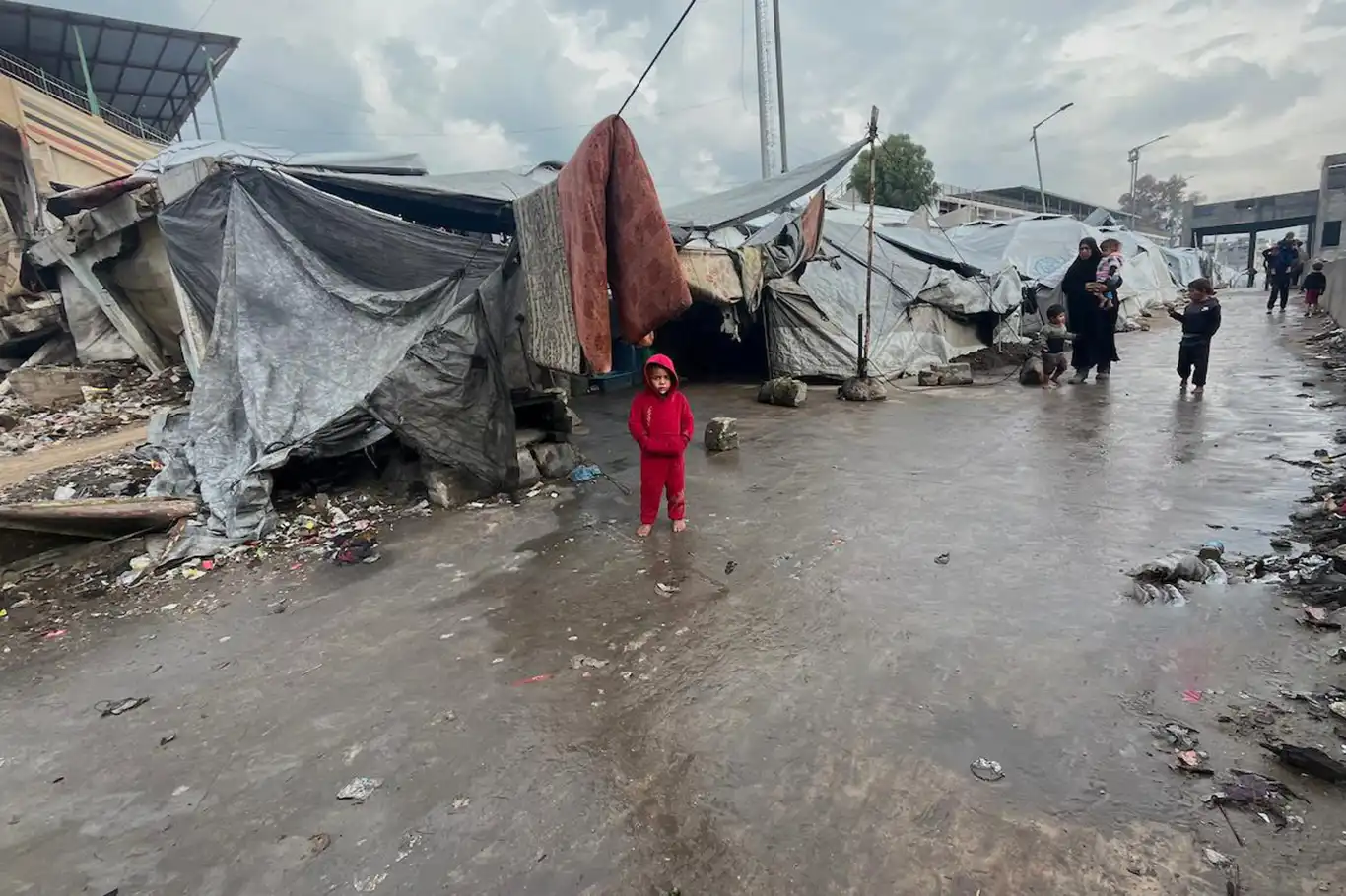 Displaced families in Gaza face severe hardship as winter storm floods tent camps