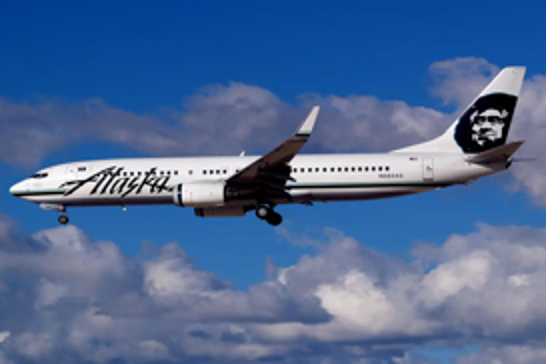 Passenger attempts to open emergency exit mid-flight on Alaska Airlines