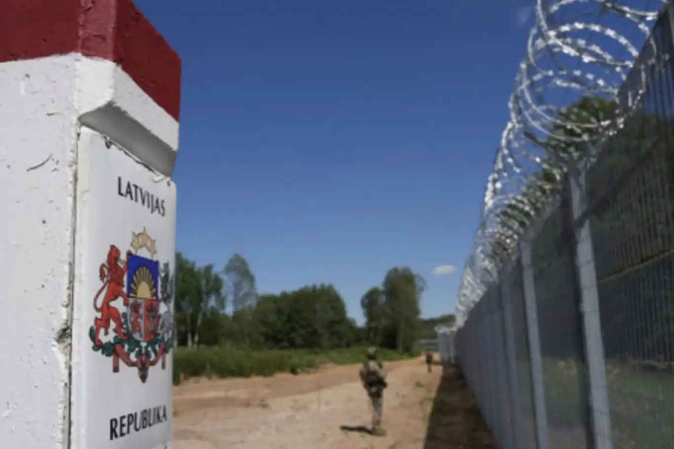 Latvia completes 280-kilometer fence along Russian border
