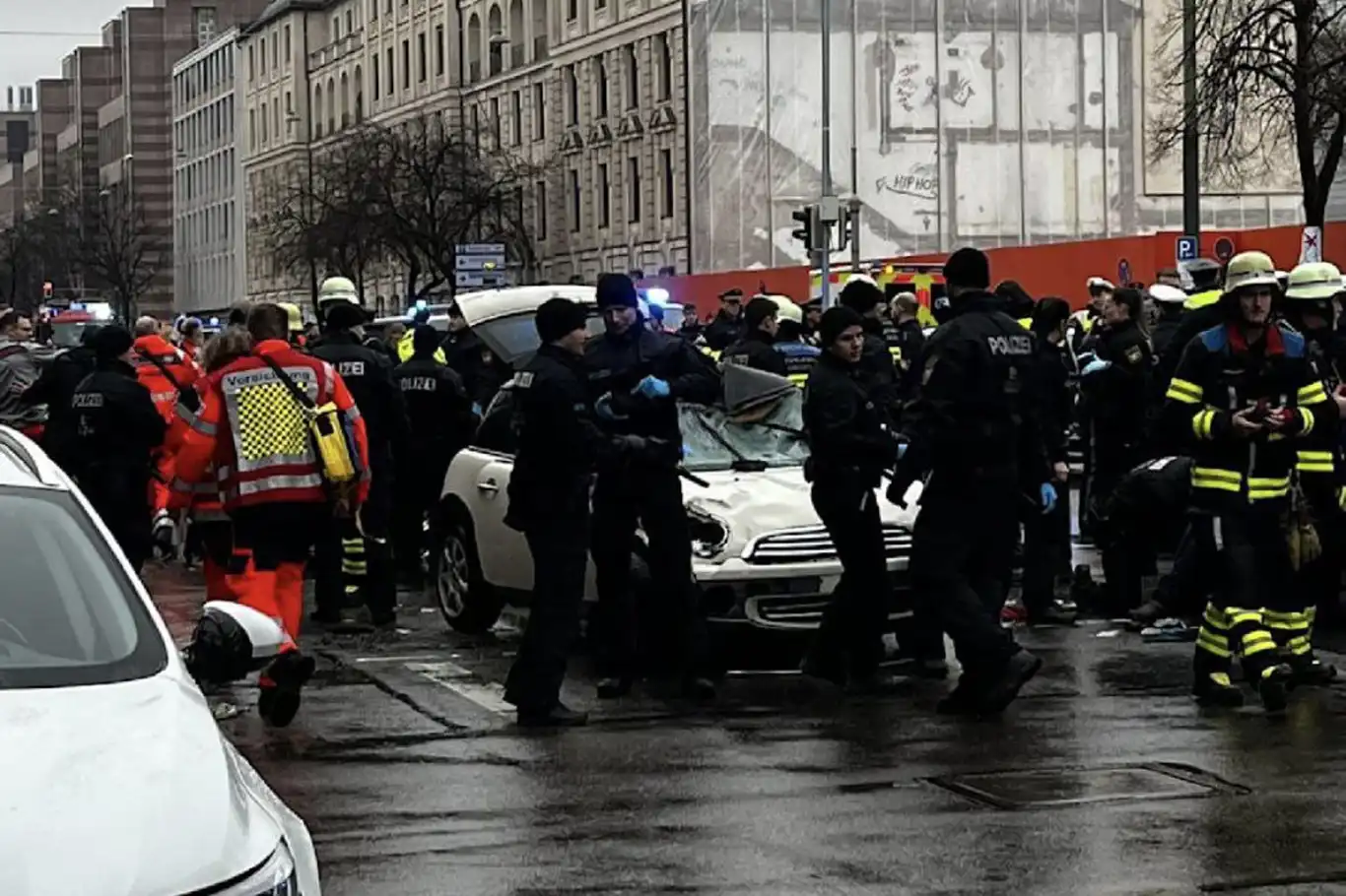 Car plows into crowd in Munich, injuring at least 20