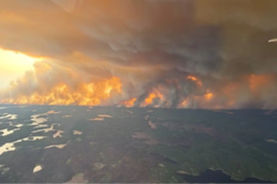 Canada’s wildfire emergency grows as flames cross provincial borders