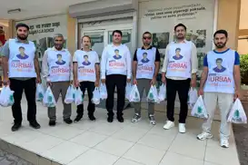 Antalya'da  Yasin Börü ve arkadaşlarının anısına muhtaç ailelere kurban eti dağıtıldı