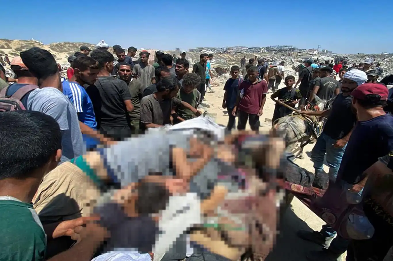 Gazze'de yeni katliam: 22 şehit, 5'i yardım beklerken hedef alındı Gazze'de yeni katliam: 22 şehit, 5'i yardım beklerken hedef alındı