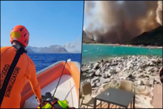 Tourists rescued by sea as wildfire sweeps Sardinia coast in Italy