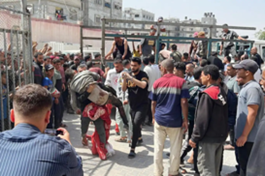 Israeli troops massacre Palestinians waiting for aid in Gaza