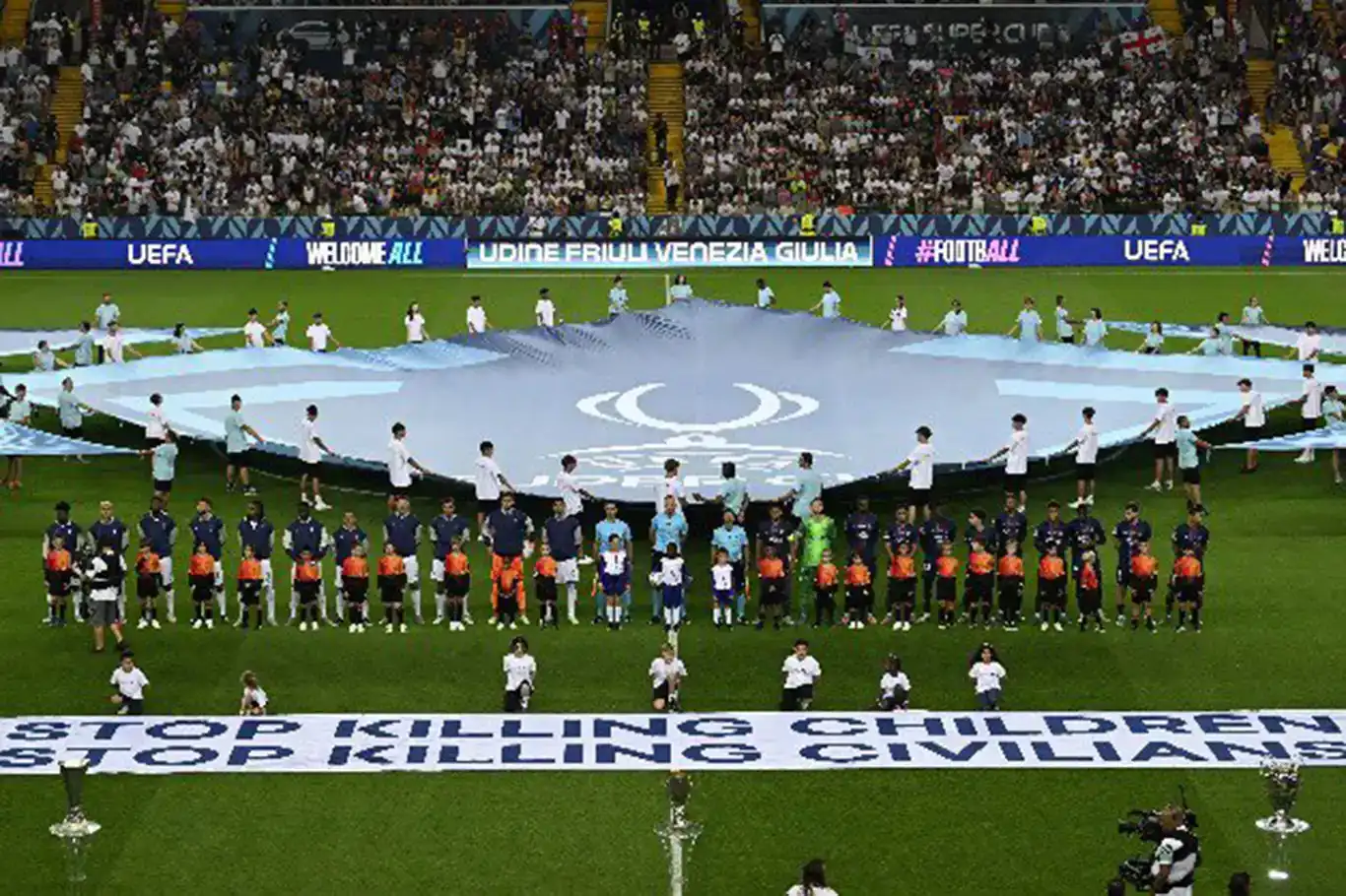 Palestinian children send powerful message against Israel’s genocide at UEFA Super Cup Palestinian children send powerful message against Israel’s genocide at UEFA Super Cup