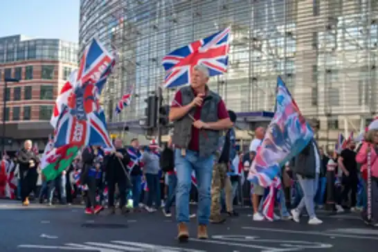 Violence breaks out as 150,000 attend far-right rally in the UK