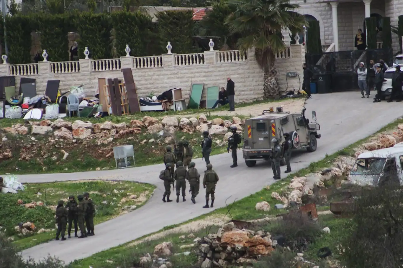 Israeli forces raid homes, assault civilians in occupied West Bank