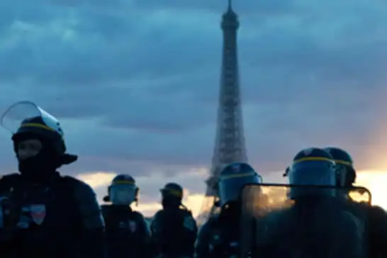 France imposes partial curfews after violent protests