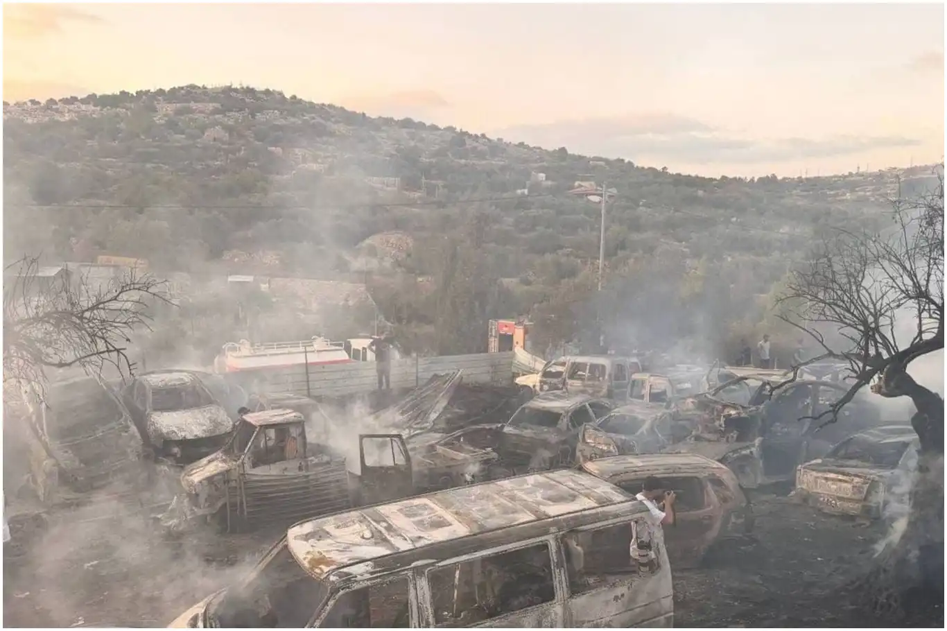 İşgalci siyonistler Ramallah’ta araç deposu ve zeytin ağaçlarını yaktı