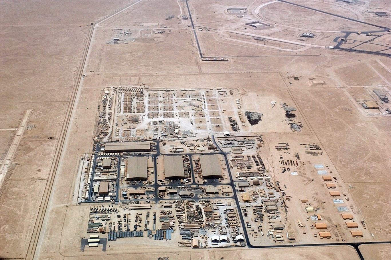 US conducts military buildup at Qatar base as C-130 aircraft land at Al Udeid