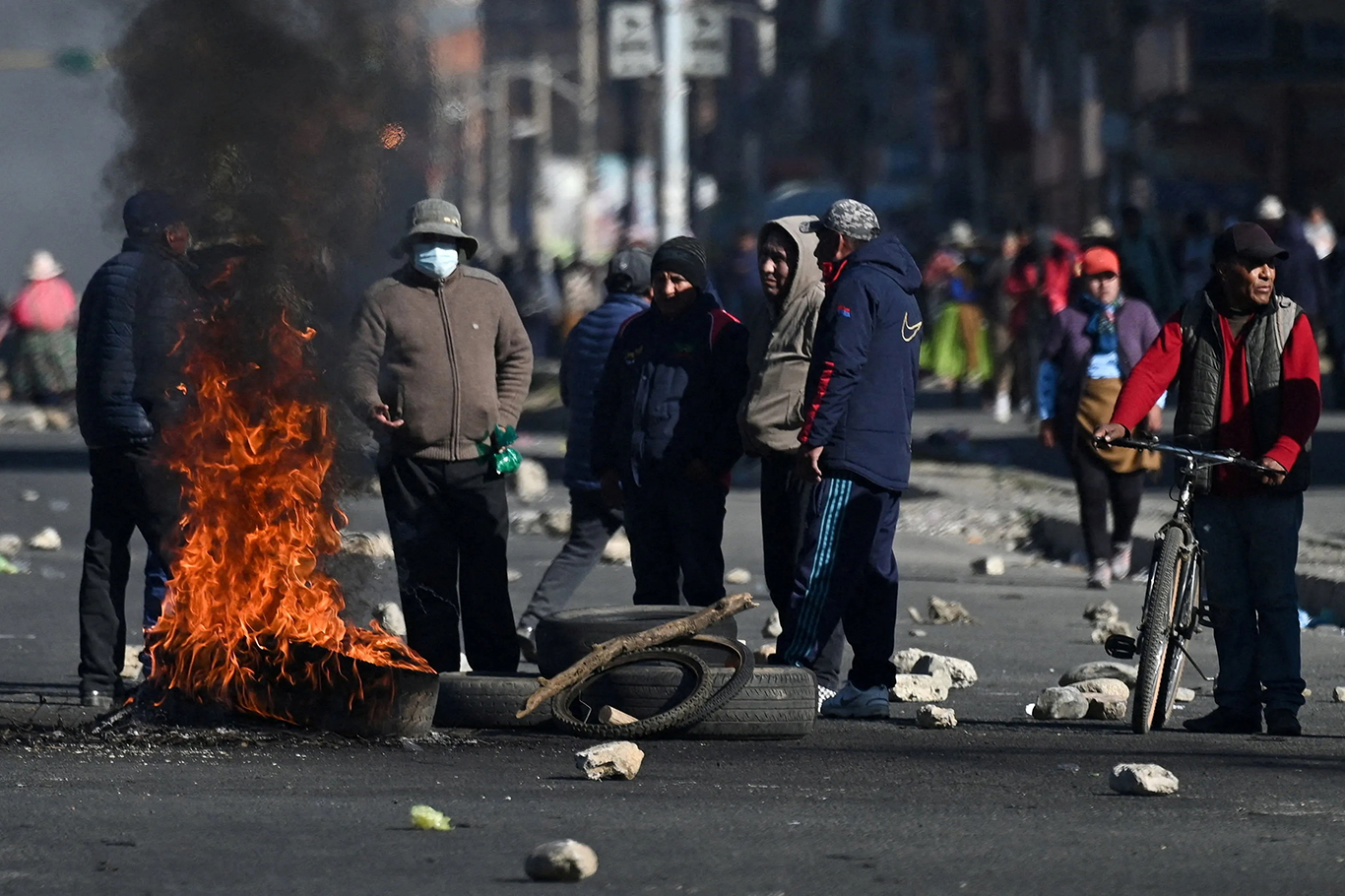 Bolivian forces clash with protesters in La Paz as economic crisis triggers nationwide unrest