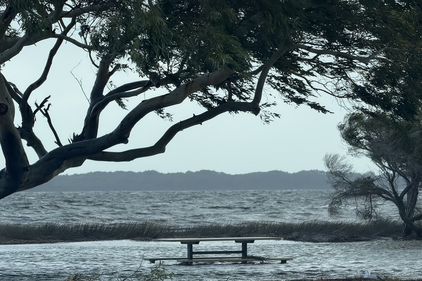 Thousands without power as powerful storm system batters western Australia