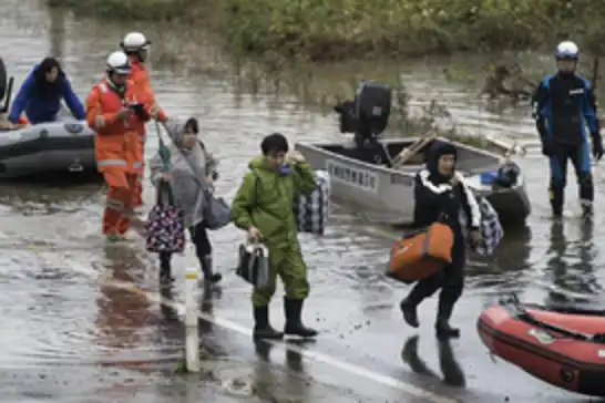 Japan issues heavy rain warning as two typhoons approach