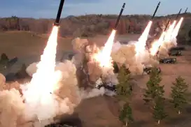 North Korean leader hails new weapons as South Korea speeds drone deployment