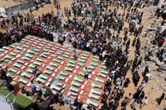 Mass funeral held in Gaza for 112 Palestinians recovered from rubble months after Israeli massacre