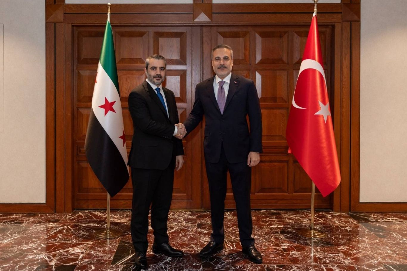 فيدان يبحث مع نظيره السوري مستجدات مجلس التنسيق الأعلى بين تركيا وسوريا