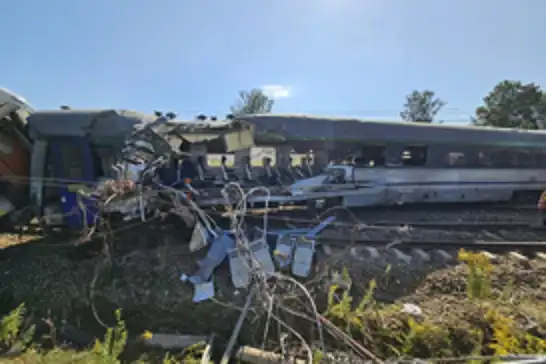 One dead, 19 injured after train collides with truck in Poland