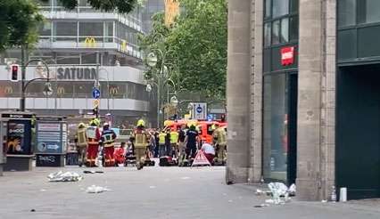 One dead, 20 injured after car drives into crowded shopping area in ...